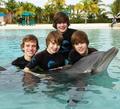 Justin Beiber in Bahamas with Dolphin - justin-bieber photo