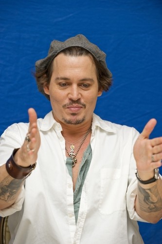  Johnny Depp on “Rum Diary” photocall at the Four Seasons hotel in Beverly Hills, 10.13.11