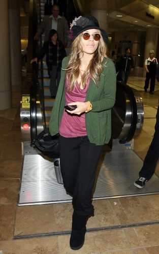 AnnaLynne McCord arriving at LAX (October 21).