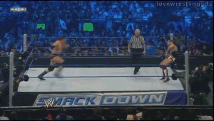  Wade does the big boot to Daniel Bryan
