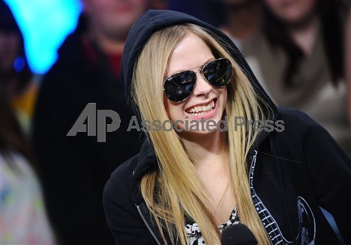 Avril Lavignes AOL Music artist page features Avril Lavigne latest