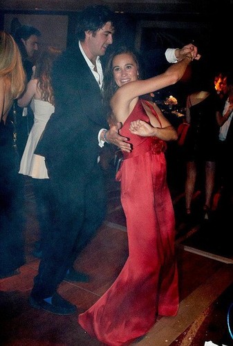  Pippa dances with a mystery man at the event on October 1