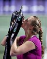Year Kvitova. After she won Wimbledon ,she won also Tournament Champions  - tennis photo