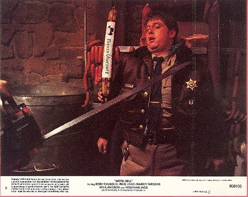  Paul Linke as Sheriff Bruce Smith in Motel Hell