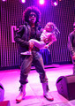 Prince holdin a lil girl while performin - princeton-mindless-behavior photo
