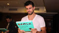 Players with their books - fc-barcelona photo