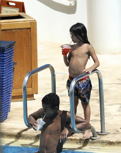 Jaafar and Blanket drinking in the pool