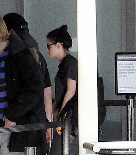 Kristen Stewart at LAX airport in Los Angeles, California - January 29, 2012.