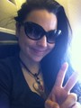 Amy on the plane going to japan  - amy-lee photo
