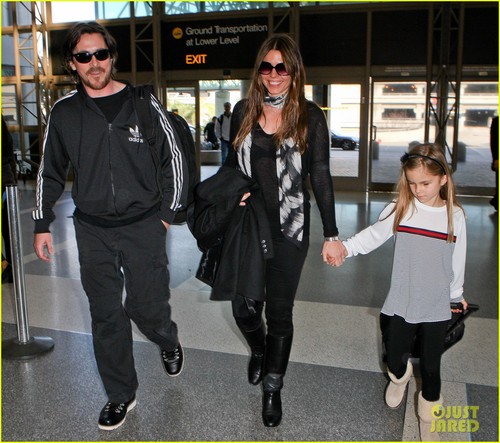 Christian Bale & Family Take Flight