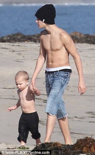 Justin bieber at family the beach in California