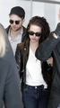 Kristen Stewart & Robert Pattinson arrive at Roissy Airport in Paris, France - March 8, 2012. - kristen-stewart photo