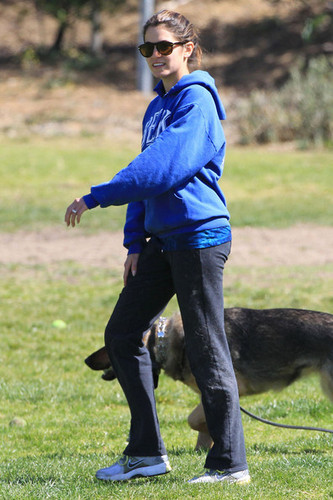  Nikki Reed & Paul McDonald out with their German Shepherds in a park in Hollywood - March 7, 2012.