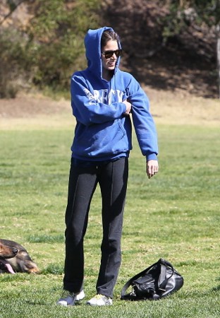 Nikki Reed & Paul McDonald out with their German Shepherds in a park in Hollywood - March 7, 2012.
