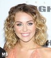 Miley - 24. March- Celebrity Fight Night: Red Carpet - miley-cyrus photo