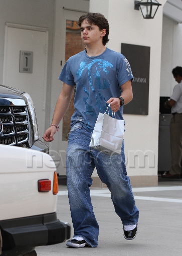 March 29, 2012: Prince Jackson pictured accompanied by a bodyguard while shopping at Giorgio Armani  - prince-michael-jackson photo