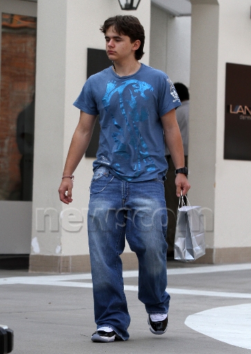 March 29, 2012: Prince Jackson pictured accompanied by a bodyguard while shopping at Giorgio Armani  - prince-michael-jackson photo