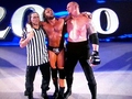 undertaker helping triple H - wwe photo