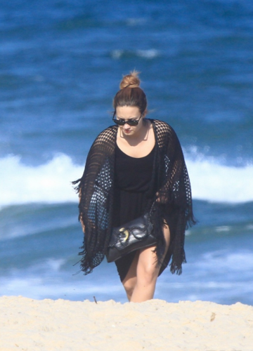 Demi - Hits the beach with friends in Rio De Janeiro, Brazil - April 18th 2012