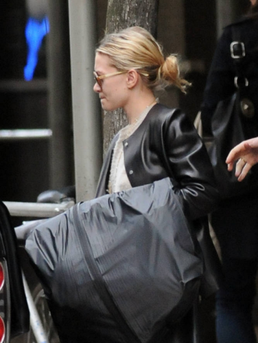  Ashley - Getting into her SUV in the West Village, New York,  April 10, 2012