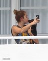 17/05 On The Balcony Of Her Hotel In Miami, Florida - miley-cyrus photo