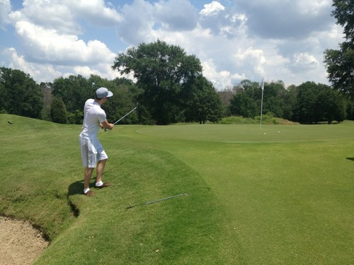 Chord golfing on his holiday in Texas