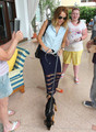 Stops for fans while walking Happy in Miami [15th May] - miley-cyrus photo