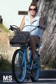 29/05 Riding Her Bike In Toluca Lake - miley-cyrus photo