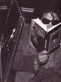 Mikey baby . . . you do know the books upside down, don't you? O.o - michael-jackson photo