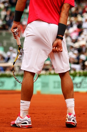  Rafael Nadal of Spain pulls his shorts