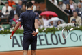 Novak Djokovic throws his racquet in anger, French Open, Roland Garros, Paris, June 10, 2012  - tennis photo