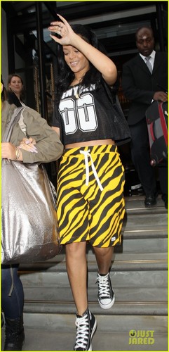 Rihanna rocks tiger-print shorts while leaving a hotel on Tuesday (June 19) in London
