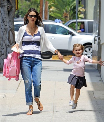  Alessandra picking up her daughter Anja after a full siku at school and taking her dog to the vet