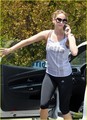 Jennifer Lawrence uses her phone while arriving at the gym with a friend on Thursday (June 21)  - jennifer-lawrence photo