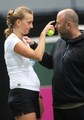 Petra Kvitova touches her coach - tennis photo