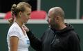 Petra Kvitova touches her coach - tennis photo