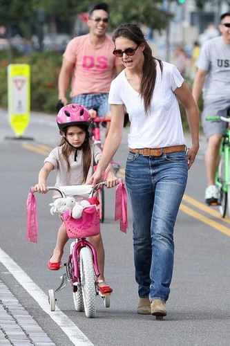 Katie Holmes Helps Suri Ride a Bike [August 18, 2012]