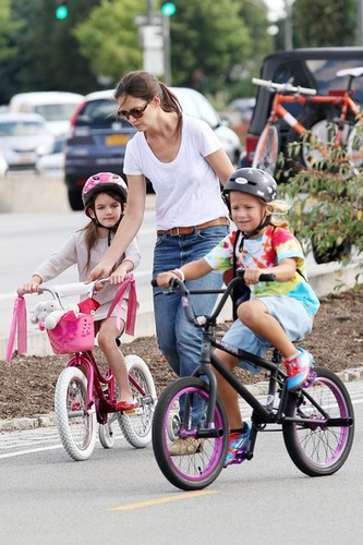 Katie Holmes Helps Suri Ride a Bike [August 18, 2012]