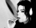 MJ eating a lollipop - michael-jackson photo