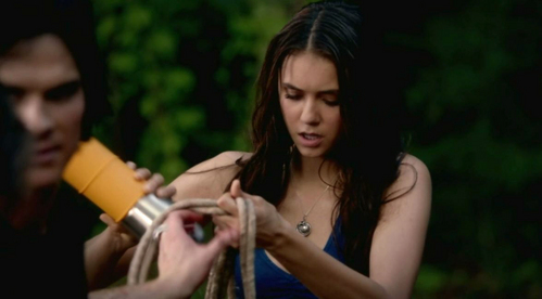  In this scene, Elena is pouring what onto the rope?