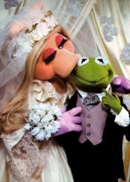  What does Miss Piggy say her married name is?