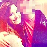  Who's in this picture with Demi?