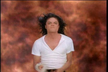  Does Michael wear a hat in Black atau white video?
