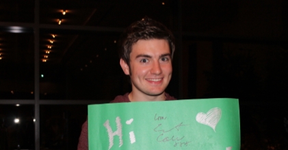  In the picture below Emmet is holding a sign that says "Hi ____________!"