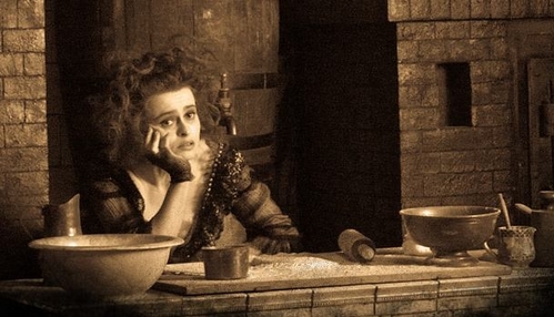Sweeney Todd: What kind of drink does Mrs.Lovett offer to Sweeney in the song Worst Pies in London?