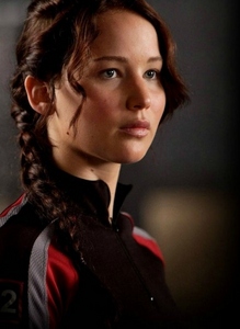 How old was Katniss when her father died?