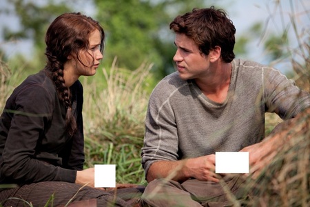 What were Gale and Katniss holding in their hands in this picture?