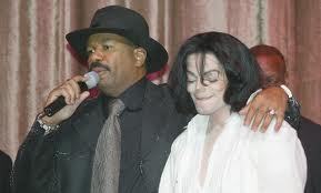  Who is this man in the photograph with Michael Jackson