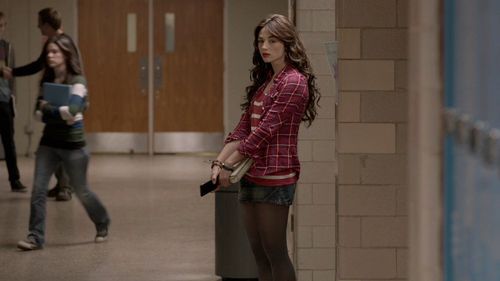 Who was flirting with Scott when Allison saw them in the hallway and claimed she wasn't jealous?