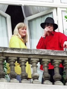  Who is this spouse in the photograph with Michael